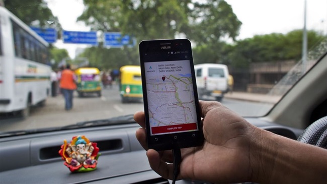 Uber یک سرویس تاکسیرانی و نرم افزاری مشابه با Spotify به نام Gaana در هند همکاری میکنند